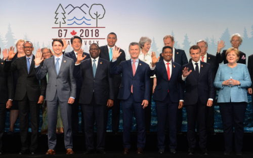 World leaders pose for group photo during 2018 g7 meeting.