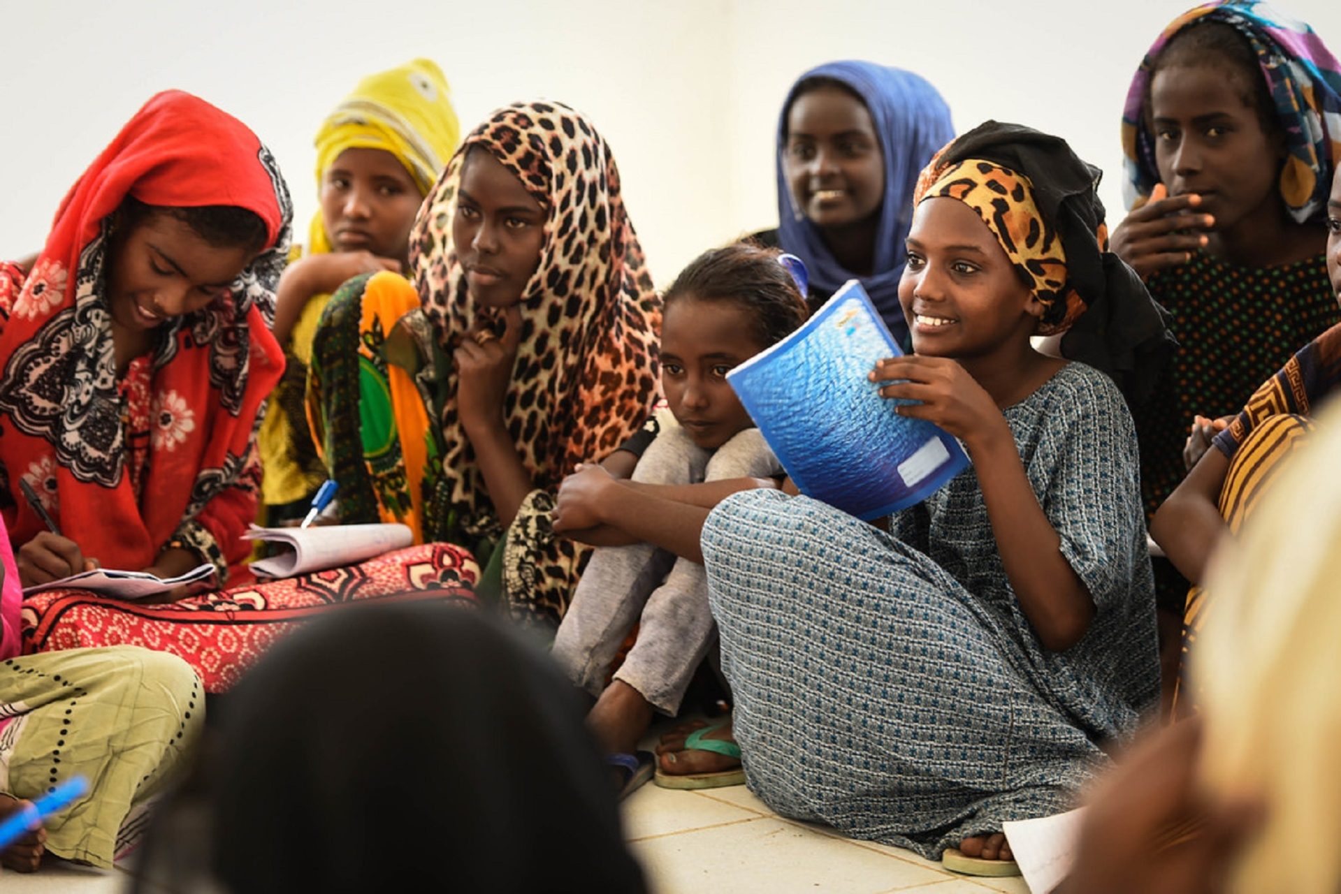 Djiboutian students participate in a learning activity as U.S. Soldiers from Charlie Company, 443rd Civil Affairs Battalion deployed to Combined Joint Task Force-Horn of Africa (CJTF-HOA), teach English lessons March 9, 2018 in Obock, Djibouti. Through key leader engagements and English discussion groups, the civil affairs team works to further improve relations between the local national populace and U.S. forces, develop a greater understanding of the Tadjoura and Obock regions, fill information gaps, coordinate future missions and maintain access to key areas.